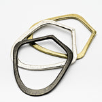 Abstracta Bangles in Sterling Silver, Oxidized Sterling Silver and Bronze