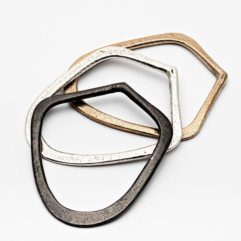 Abstracta Bangles in Sterling Silver, Oxidized Sterling Silver and Bronze